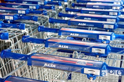 urk  netherlands july   parked shopping trolleys  dutch aldi drugstore stock