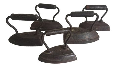 antique cast iron industrial primitive hand irons set   chairish