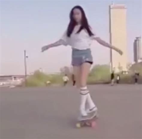asian girl skates on longboard in seoul dancing and jumping on her ride travel news travel