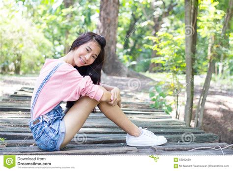 teen beautiful girl pink shirt denim shorts stock image image of people brunette 55902689
