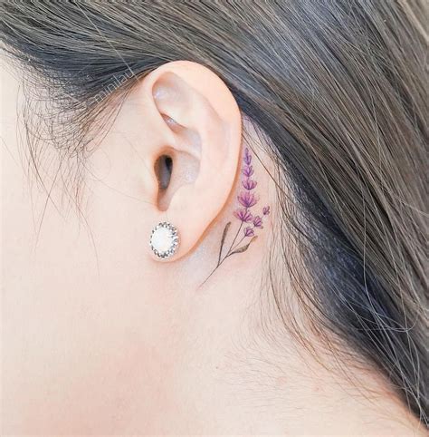 stunning   ear tattoos    ear tattoos flower