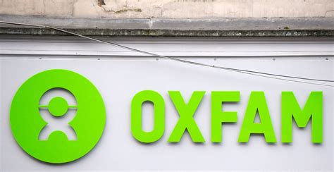 oxfam accused of cover up by redacting aid worker names in