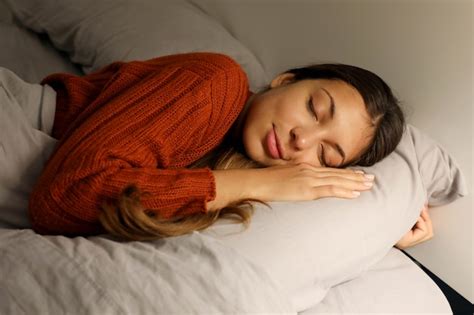 Premium Photo Young Woman Sleeping Peacefully On The Bed