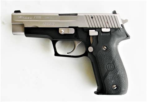 review sig p stainless semi auto pistol  shooters log