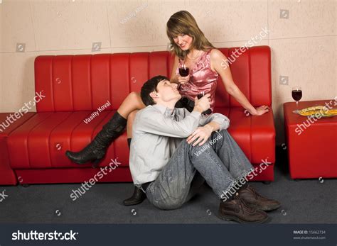 young people sitting   drinking stock photo