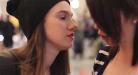 girl attempts to kiss strangers in grand central station on camera