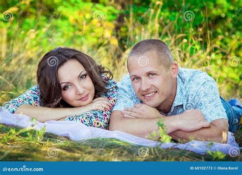 Couple Laying On The Grass Stock Image Image Of Nature 60102773