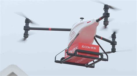 drones capable  carrying  ton cargo part  alibaba rivals grand project rt news
