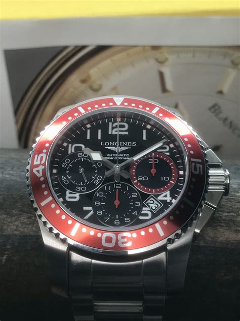longines hydroconquest chronograph red bezel mm swiss automatic  diver  sutor house
