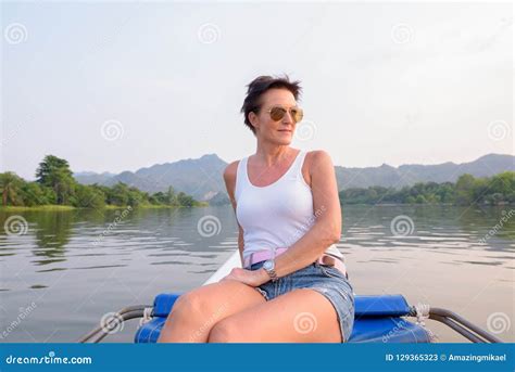 Mature Beautiful Scandinavian Tourist Woman Traveling With Boat In