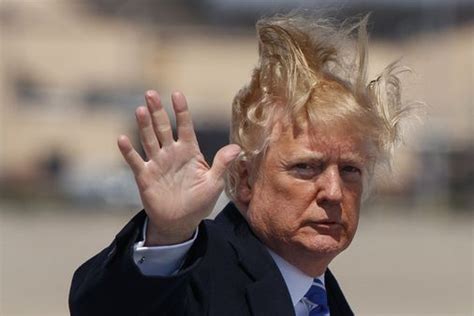 trump s hair blows around on a blustery day and many take notice the
