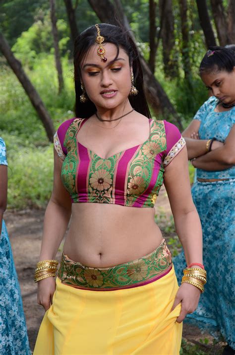 Sonia Agarwal Hot Navel And Cleavage Show