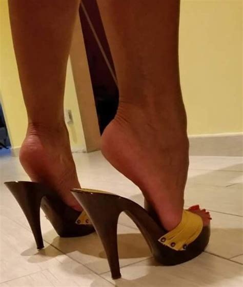 she s showing how high these heels should be stiletto
