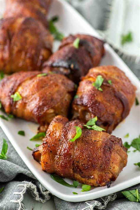bacon wrapped chicken thighs recipe easy  tasty chisel fork