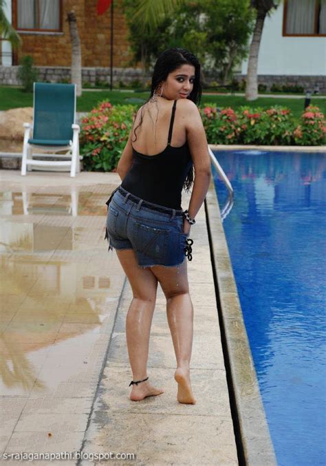 Hot And Sexy Wet Charmi In Swim Suit At Swimming Pool