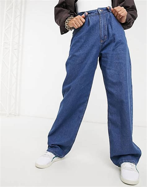 Asos Design High Rise Relaxed Dad Jeans With Pleat Front In Midwash