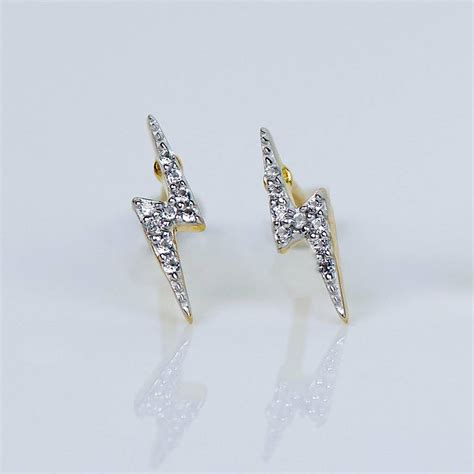 gold vermeil lightning bolt diamond stud earrings  carrie