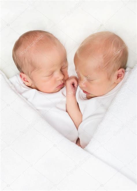 sleeping twin babies stock photo  klanneke