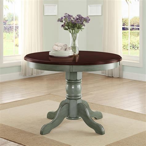 rustic small space   pedestal dining table antique sage seats