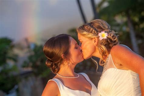 lesbian wedding kisses brides rainbow samesex wedding
