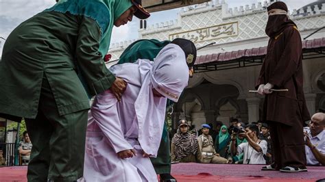 four face lashing in indonesia s aceh province over gay sex