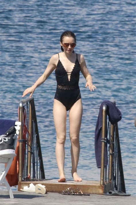 Lily Collins In Swimsuit At The Beach In Italy Gotceleb