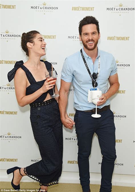 lizzy caplan and fiance tom riley get the giggles daily mail online