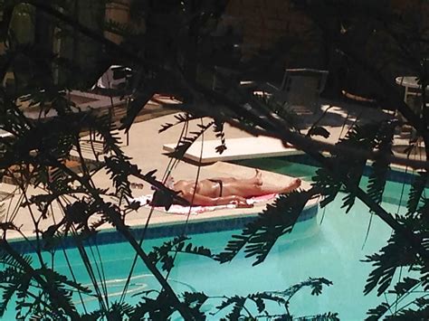 My Neighbor Elle Sunbathing Topless In Thong 35 Pics