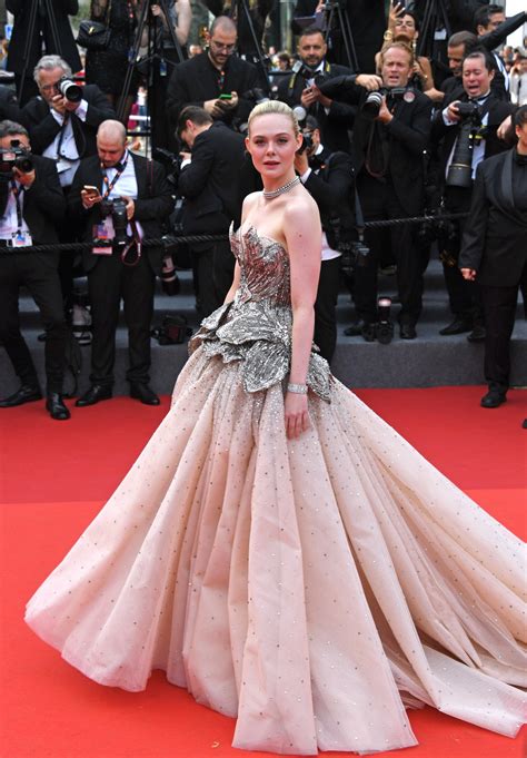 elle fannings unpredictable fashion  keeping cannes   toes
