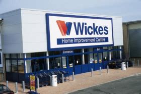 wickes owner sees    growth  price increase