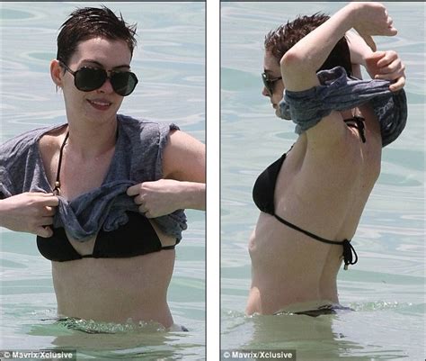 anne hathaway reveals her slender beach body after losing