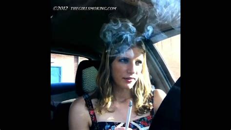 girl smoking virginia slim 120s hands free front view