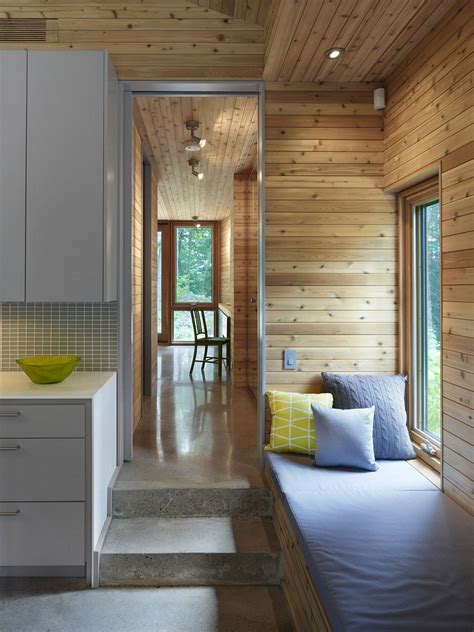 ultra modern cabin blends rustic warmth  modern minimalism