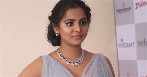 sexy busty manasa himavarsha wow huge boobs in deep neck gown sexy cleavages amazing meat
