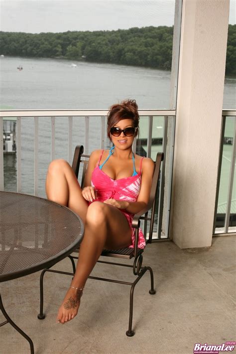 sexy briana lee strips a bikini at a lake side