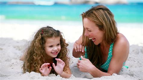 Smiling Mother Tickling Her Daughter Stock Footage Video