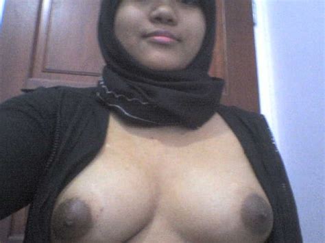 fat malay camwhore displays her big tits in her private selfies