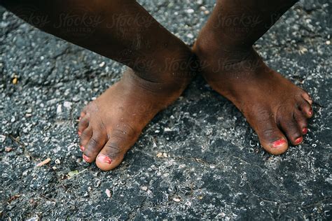african american girl s feet doing ballet plie by stocksy contributor