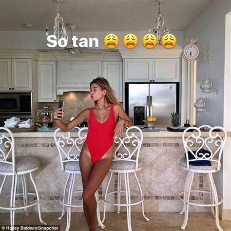 hailey baldwin shows off tan lines and sunkissed physique daily mail online