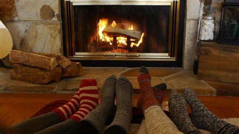 Teen Girls Play Footsie In Front Of A Fireplace Stock Video Footage