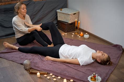 Premium Photo Asian Woman Getting Traditional Thai Stretching Massage