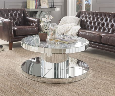 ornat mirror glass round coffee table with faux stones by acme