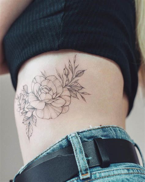 Share 72 Flower Tattoos On Rib Cage Latest In Eteachers