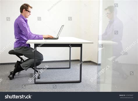 Correct Sitting Position At Workstation Man On Kneeling