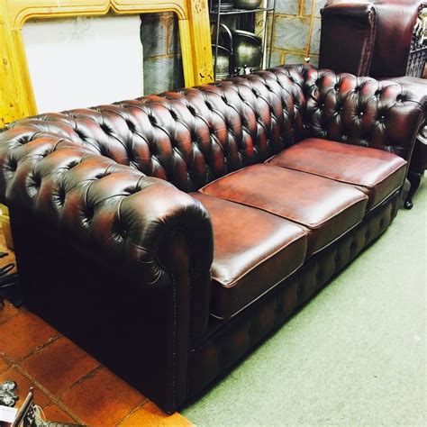 dog house antiques pair  chesterfield style sofas