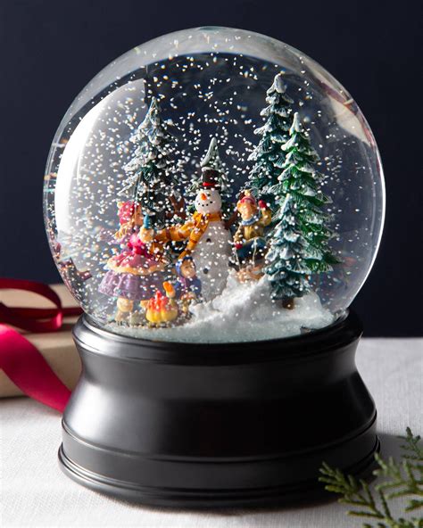 musical snowman snow globe  add christmas cheer