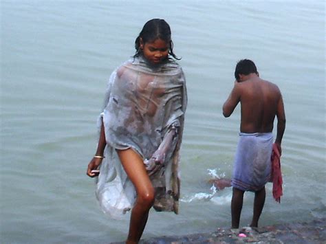 nude indian women bathing river penty photo