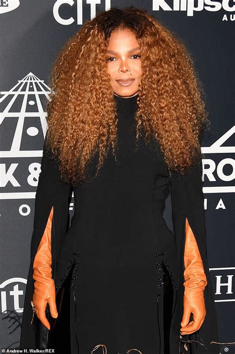Janet Jackson Is A Glamour Goddess In Feathers And Gloves As She Enters