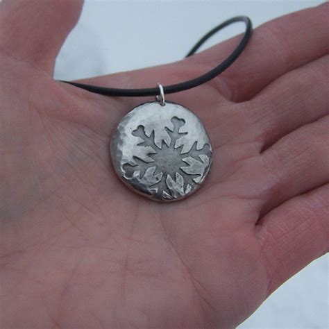 hammered snowflake necklace