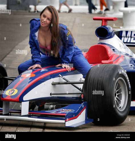 Racing Cars And Sex A Model Poses For Photographers On The